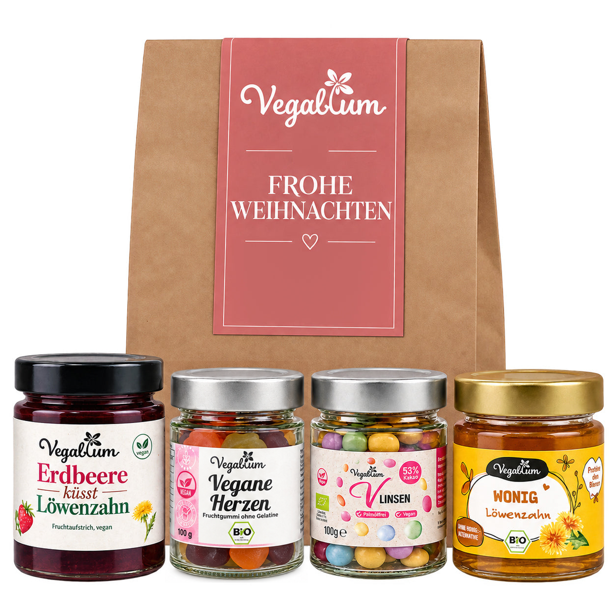 Vegane Geschenktüte mit Grußetikett Frohe Weihnachten und vier Vegablum Leckereien