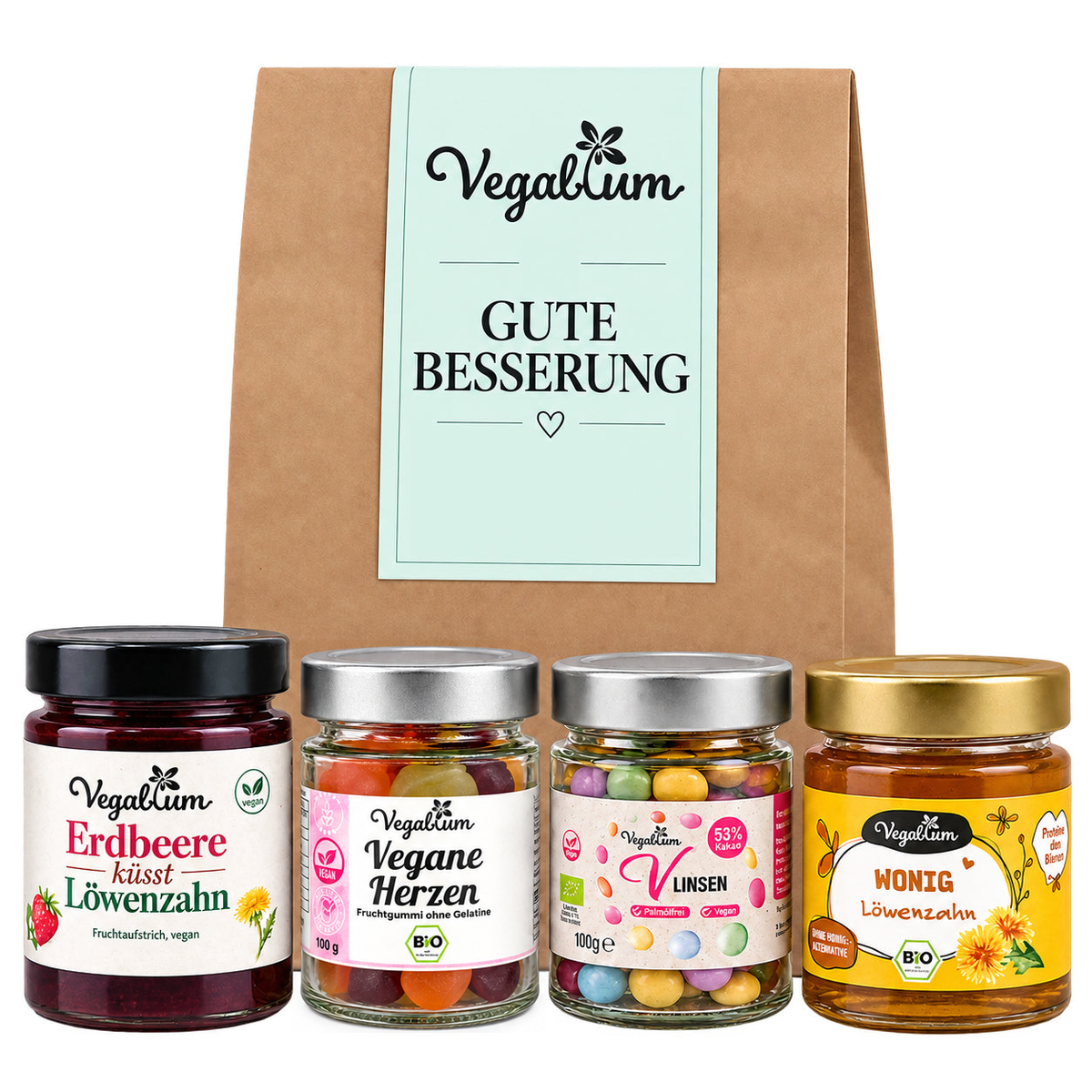 Vegane Geschenktüte mit Grußetikett Gute Besserung und vier Vegablum Leckereien