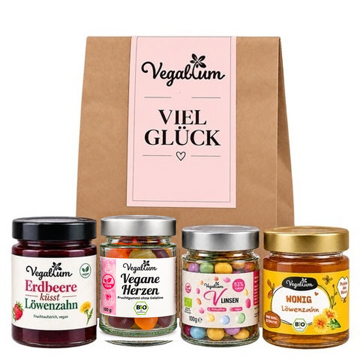Vegane Geschenktüte mit Grußetikett Viel Glück und vier Vegablum Leckereien